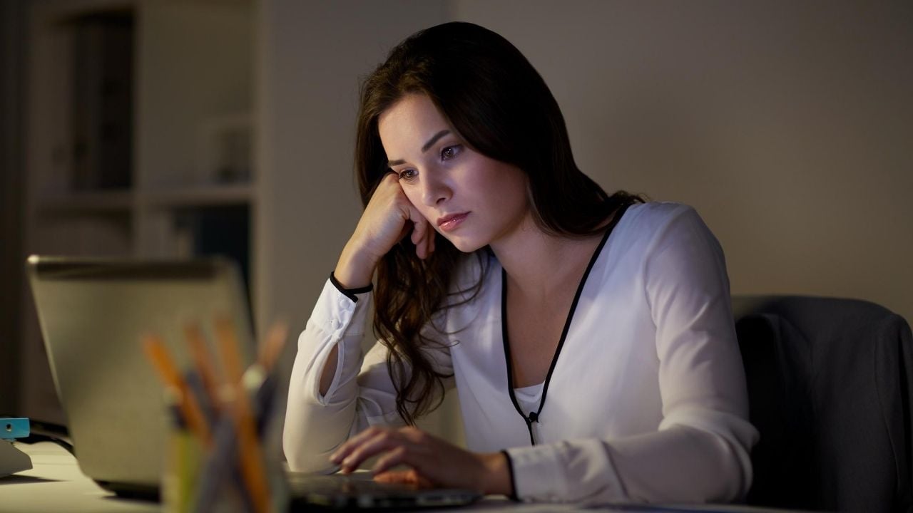 woman looking at a laptop